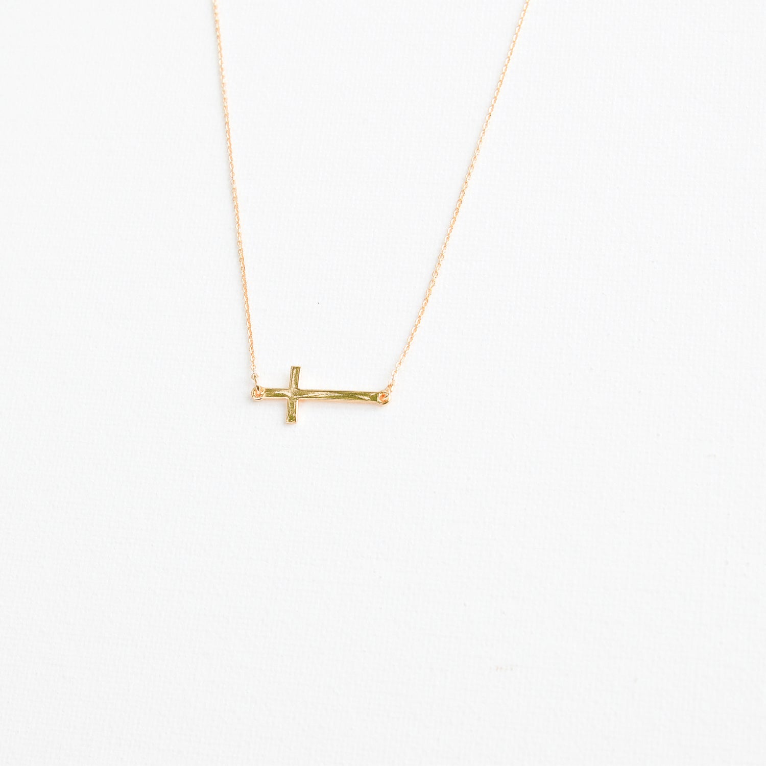 Michelle McDowell Sideways Gold Cross Necklace