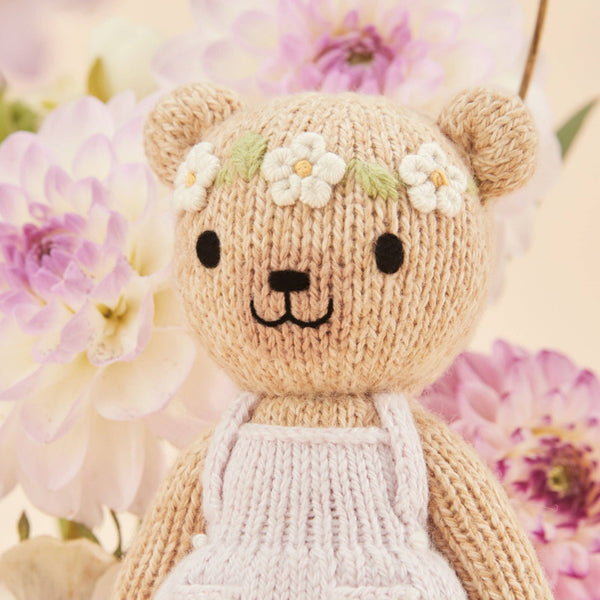 Tiny Olivia the honey bear, gives 10 meals