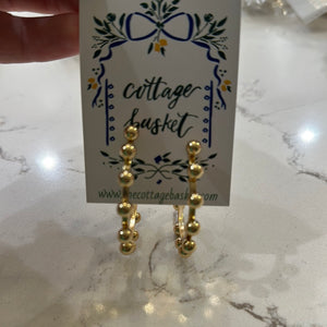 Shiny gold beaded hoop earrings