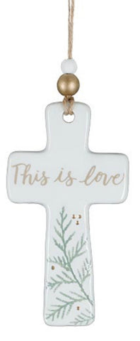 Ceramic cross with “love” ornament