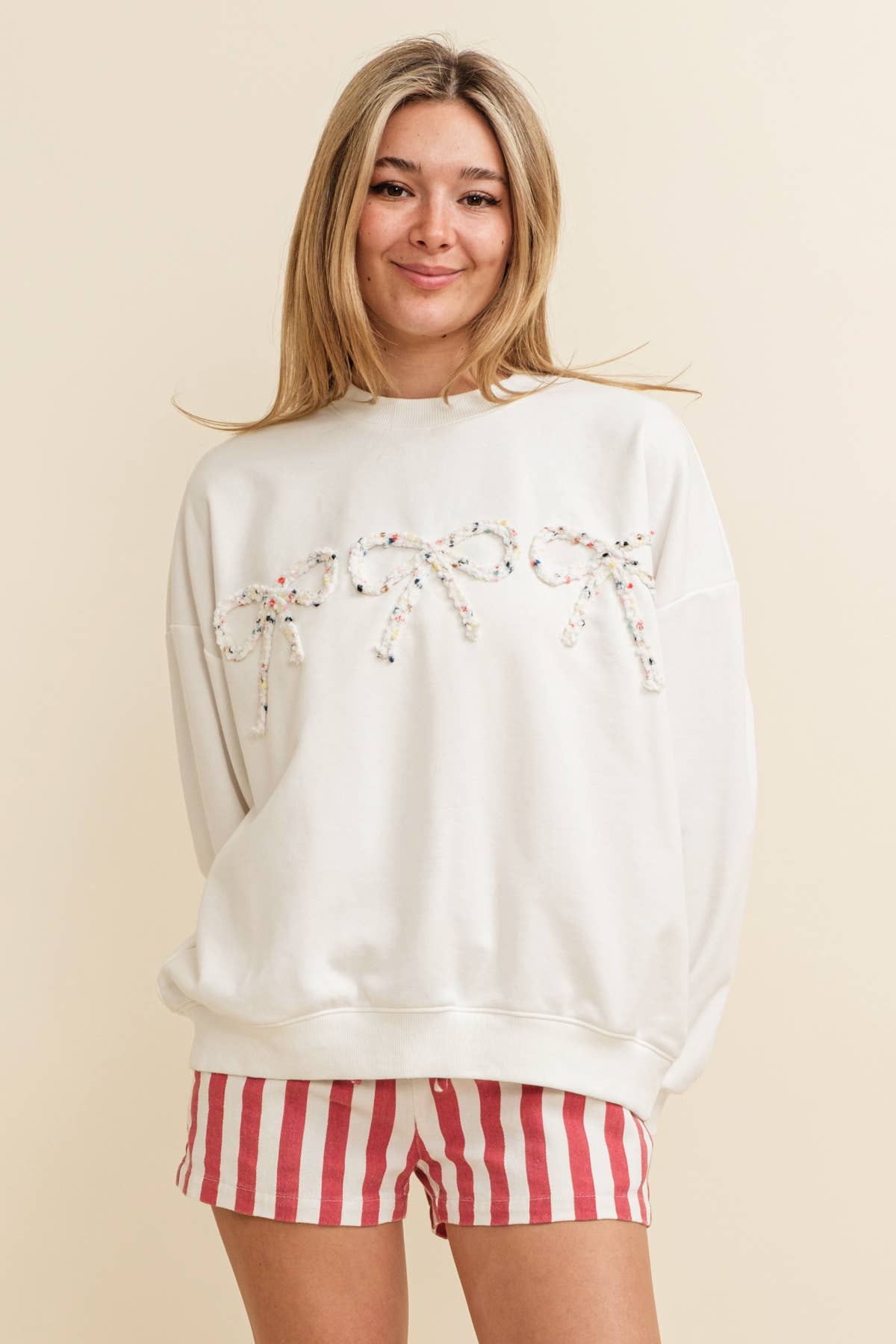 BOW ACCENT PULLOVER TOP
