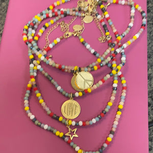 Beaded kids necklace with charm