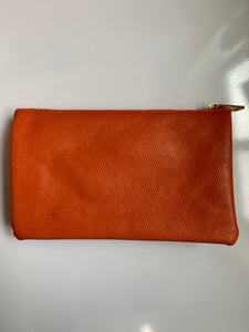 Orange clutch with strap