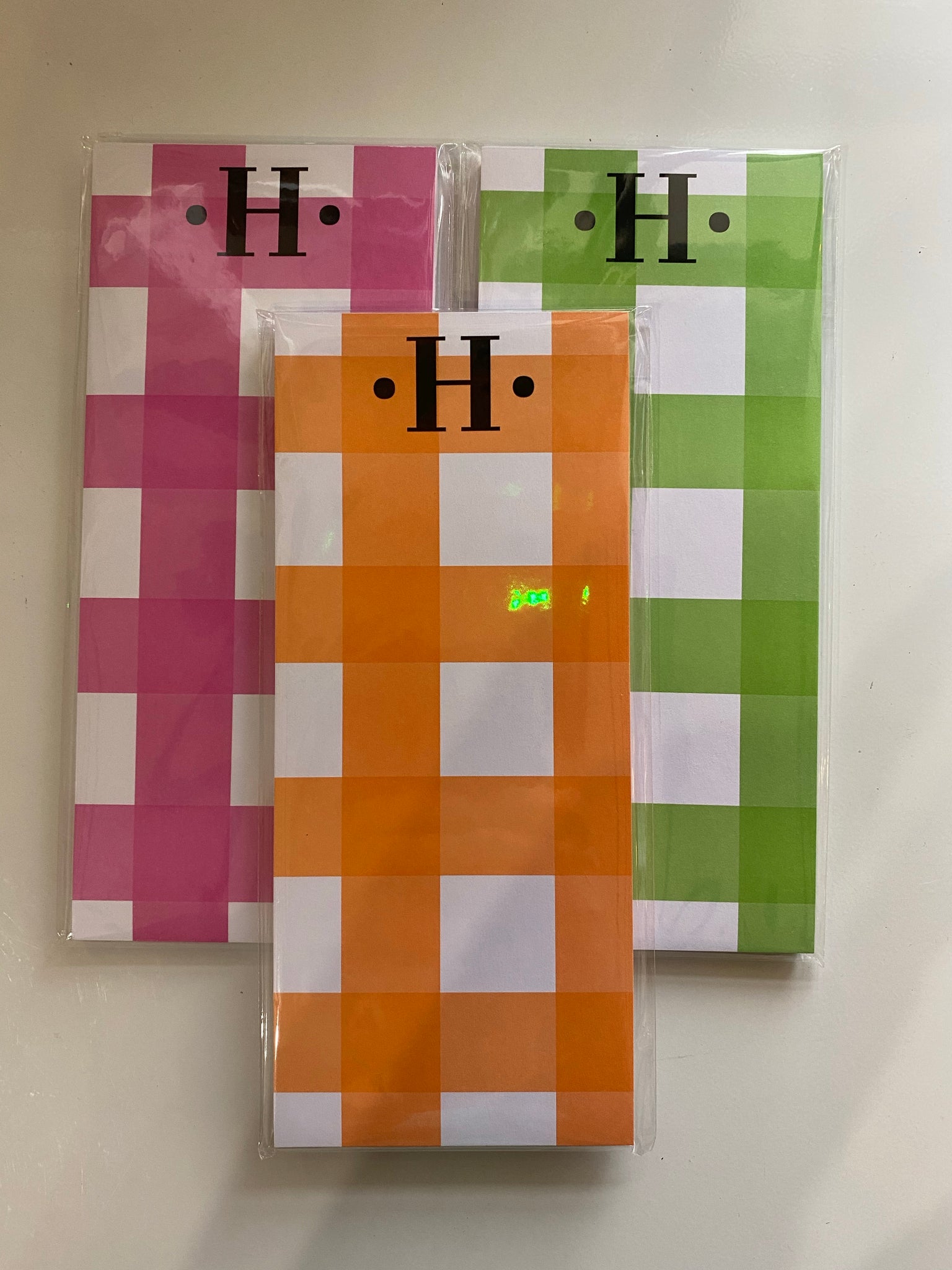“H” gingham notepad