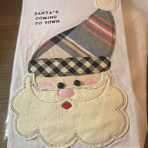 Santa’s coming to town tea towel