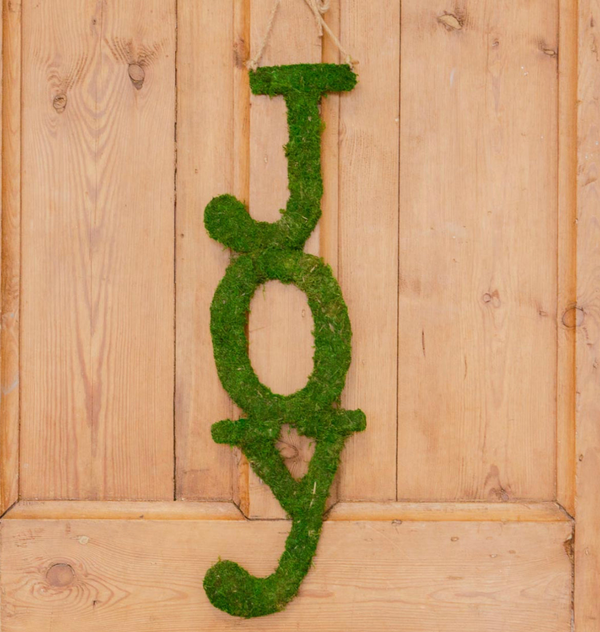 Vertical “JOY” moss wreath