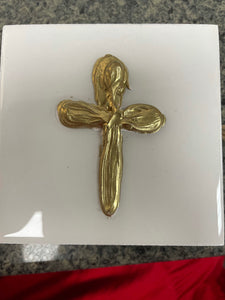 White canvas with gold cross