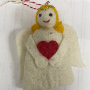 Angel with heart ornament