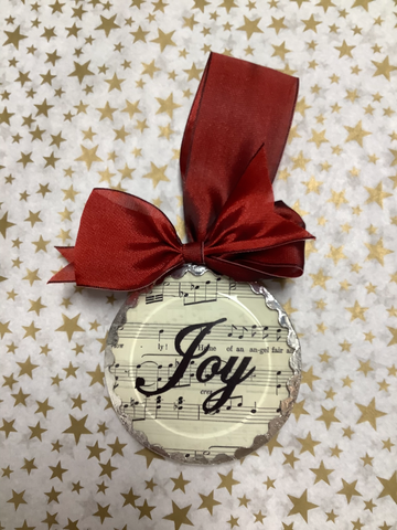 Joy Round Beveled Glass Ornament with a Red Ribbon