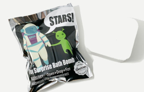 Astronaut toy surprise bath bomb