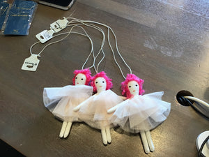 Doll necklaces